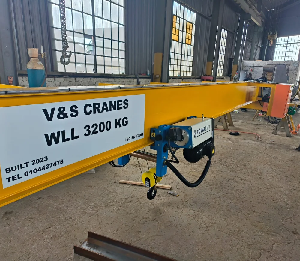 Yellow V and S crane beam marked WLL 3200 kg with a suspended hook